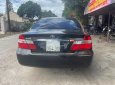 Toyota Camry   2.4G  2003 - Bán xe Toyota Camry 2.4G năm 2003, màu đen số sàn, giá chỉ 265 triệu