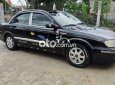 Kia Spectra   2004 - Cần bán gấp Kia Spectra năm 2004, màu đen, nhập khẩu 