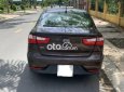 Kia Rio Si 1.4 AT 2015 - Bán xe Kia Rio Si 1.4 AT đời 2015, màu nâu, nhập khẩu nguyên chiếc xe gia đình, giá 385tr