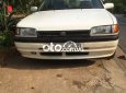 Mazda 323  MT 1996 - Bán Mazda 323 MT năm sản xuất 1996, màu trắng số sàn, giá tốt