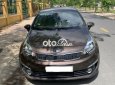 Kia Rio Si 1.4 AT 2015 - Bán xe Kia Rio Si 1.4 AT đời 2015, màu nâu, nhập khẩu nguyên chiếc xe gia đình, giá 385tr