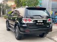 Toyota Fortuner G 2015 - Cần bán xe Toyota Fortuner G năm sản xuất 2015, màu đen số sàn, giá 642tr