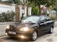 Daewoo Lacetti  EX 2005 - Cần bán lại xe Daewoo Lacetti EX năm 2005, màu đen, giá 115tr