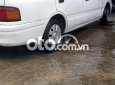 Mazda 323 1996 - Cần bán lại xe Mazda 323 2.0MT sản xuất 1996, màu trắng, xe nhập