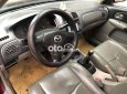 Mazda 323 2.0MT 2003 - Xe Mazda 323 2.0MT sản xuất 2003, màu đỏ, giá 125tr