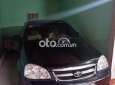 Daewoo Lacetti  EX 2010 - Cần bán gấp Daewoo Lacetti EX năm 2010, màu đen xe gia đình