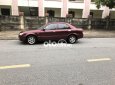 Mazda 323 2.0MT 2003 - Xe Mazda 323 2.0MT sản xuất 2003, màu đỏ, giá 125tr