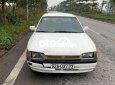 Mazda 323 1994 - Xe Mazda 323 2.0MT sản xuất năm 1994, màu trắng, xe nhập