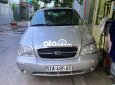 Kia Carnival  GS 2005 - Bán Kia Carnival GS năm 2005, màu bạc, nhập khẩu nguyên chiếc số sàn