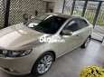 Kia Forte 2011 - Cần bán Kia Forte 1.6AT năm 2011, màu vàng chính chủ