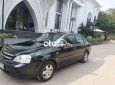 Daewoo Lacetti EX 2009 - Cần bán Daewoo Lacetti EX năm 2009, màu đen xe gia đình