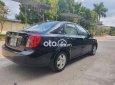 Daewoo Lacetti EX 2009 - Cần bán Daewoo Lacetti EX năm 2009, màu đen xe gia đình