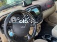 Ford Escape 2.3L AT 2004 - Bán Ford Escape 2.3L AT sản xuất năm 2004, màu đen 