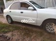 Daewoo Lanos MT 2002 - Bán Daewoo Lanos MT sản xuất năm 2002, màu trắng, xe nhập, giá chỉ 69 triệu