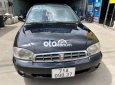 Kia Spectra 2002 - Cần bán xe Kia Spectra năm sản xuất 2002, màu đen chính chủ, 79tr