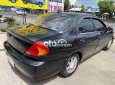 Kia Spectra 2002 - Cần bán xe Kia Spectra năm sản xuất 2002, màu đen chính chủ, 79tr