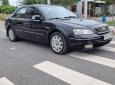 Ford Mondeo V6 2004 - Cần bán lại xe Ford Mondeo V6 sản xuất 2004, màu đen số tự động