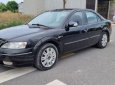 Ford Mondeo V6 2004 - Cần bán lại xe Ford Mondeo V6 sản xuất 2004, màu đen số tự động