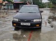 Mazda 323 2000 - Bán Mazda 323 năm 2000, màu đen số sàn