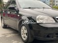 Chevrolet Lacetti   1.6MT 2011 - Bán Chevrolet Lacetti 1.6MT sản xuất 2011, màu đen, giá tốt