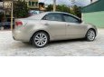 Kia Forte 2010 - Cần bán xe Kia Forte SX 1.6 AT năm sản xuất 2010, màu vàng