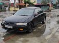 Mazda 323 2000 - Bán Mazda 323 năm 2000, màu đen số sàn