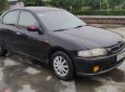 Mazda 323 2000 - Bán Mazda 323 năm 2000, màu đen số sàn