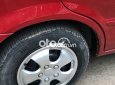 Mazda 323 2.0MT 2002 - Cần bán Mazda 323 2.0MT năm 2002, màu đỏ