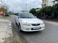 Mazda 323 2.0MT 2003 - Bán Mazda 323 2.0MT năm sản xuất 2003, màu trắng, nhập khẩu nguyên chiếc, giá 119tr