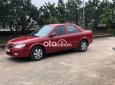 Mazda 323 2.0MT 2002 - Cần bán Mazda 323 2.0MT năm 2002, màu đỏ