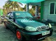 Daewoo Lanos MT 2001 - Bán Daewoo Lanos MT sản xuất năm 2001, màu đen xe gia đình