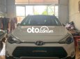 Hyundai i20 Active 1.4AT 2016 - Cần bán gấp Hyundai i20 Active 1.4AT sản xuất 2016, màu trắng, nhập khẩu nguyên chiếc xe gia đình