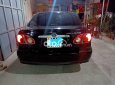 Toyota Corolla 1.8E MT 2004 - Cần bán Toyota Corolla 1.8E MT năm 2004, màu đen