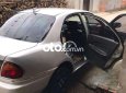 Mazda 323    MT 1997 - Bán Mazda 323 MT năm sản xuất 1997, màu bạc