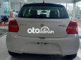 Suzuki Swift 2021 - Cần bán Suzuki Swift 1.4AT sản xuất 2021, màu trắng, xe nhập