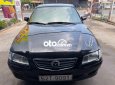 Mazda 626   MT 2002 - Cần bán gấp Mazda 626 MT năm 2002, màu đen