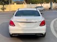 Mercedes-Benz C200 2018 - C200 trắng nội thất kem sx 2018, bản Limited có loa bum, 1 chủ từ đầu biển Hà Nội