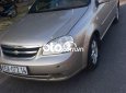 Chevrolet Lacetti 2011 - Cần bán lại xe Chevrolet Lacetti EX 1.6MT 2011, màu vàng