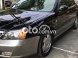 Daewoo Magnus 2004 - Cần bán gấp Daewoo Magnus năm 2004, màu đen, nhập khẩu 