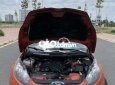 Ford Fiesta 2011 - Bán Ford Fiesta năm 2011 còn mới, giá tốt, màu đỏ cam