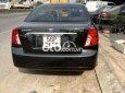 Daewoo Lacetti EX 2009 - Cần bán gấp Daewoo Lacetti EX sản xuất năm 2009, màu đen, nhập khẩu