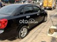 Daewoo Lacetti EX 2009 - Cần bán gấp Daewoo Lacetti EX sản xuất năm 2009, màu đen, nhập khẩu