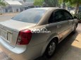 Daewoo Lacetti 2012 - Cần bán gấp Daewoo Lacetti năm sản xuất 2012, màu bạc