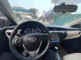 Toyota Corolla 2015 - Cần bán gấp Toyota Corolla 1.8G năm sản xuất 2015, màu đen, giá chỉ 543 triệu