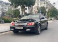 Daewoo Magnus 2004 - Bán xe Daewoo Magnus 2.0 năm sản xuất 2004, màu đen