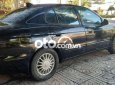 Daewoo Leganza 2002 - Cần bán gấp Daewoo Leganza sản xuất năm 2002, màu đen, xe nhập, 87tr