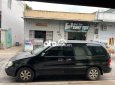 Kia Carnival 2006 - Bán Kia Carnival 2.7MT sản xuất 2006, màu đen