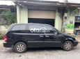 Kia Carnival 2006 - Bán Kia Carnival 2.7MT sản xuất 2006, màu đen