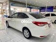 Toyota Vios 2019 - Cần bán gấp Toyota Vios 1.5E AT sản xuất năm 2019, màu trắng xe gia đình