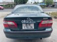 Mazda 626 2003 - Cần bán Mazda 626 MT sản xuất 2003, màu xanh lục giá cạnh tranh